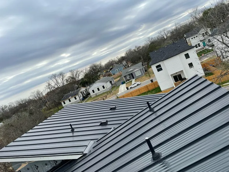 Standing seam metal roof panels with vents for Skylight Repair in Northborough